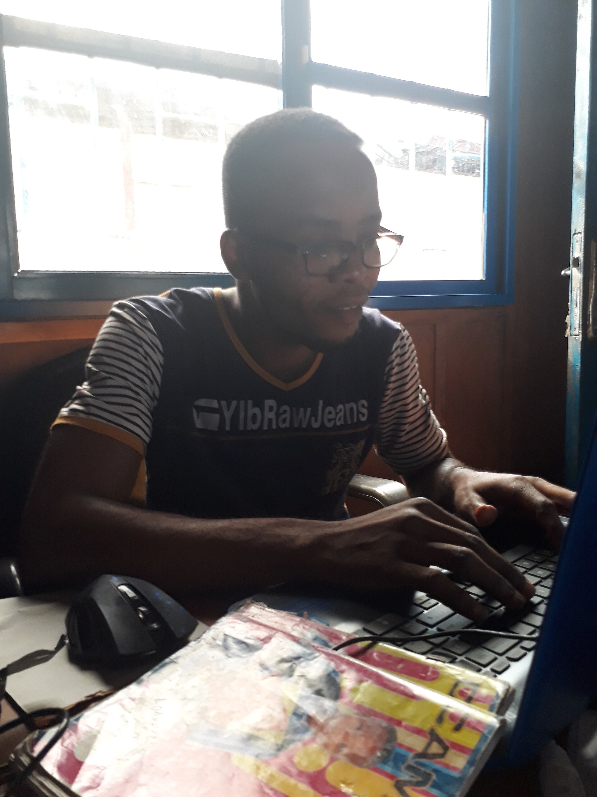 Office worker handling administrative tasks at a desk
